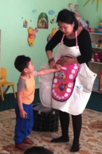 A school boy learning proper oral health practices